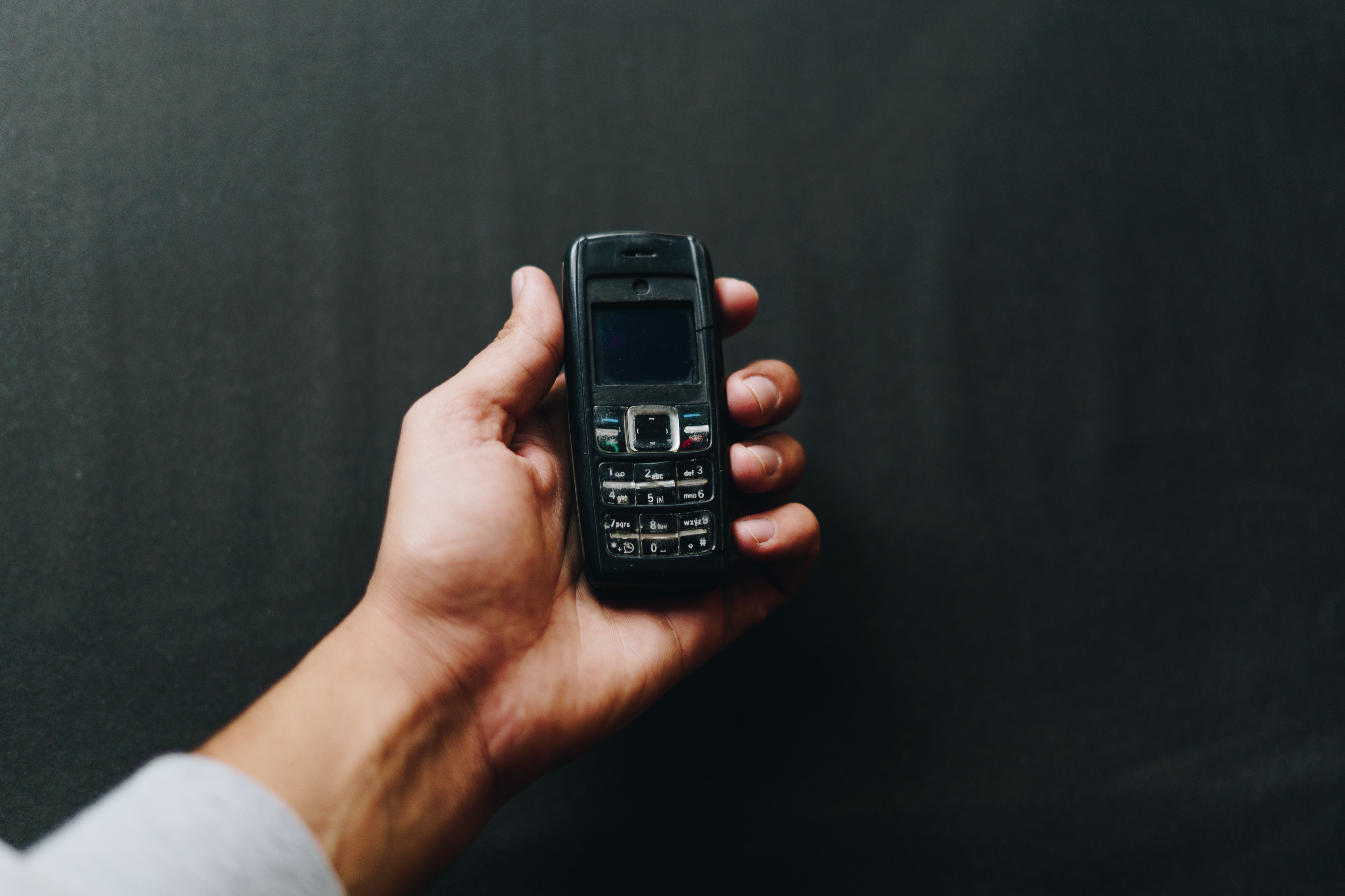 Embracing the Unlikely Resilience of Feature Phones